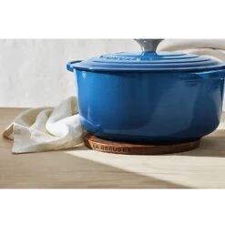 Le Creuset 8" Magnetic Wooden Trivet - Acacia Wood With Black Silicone Rings -COOKWARE Store 71eHOZuXIeL. AC SL1500